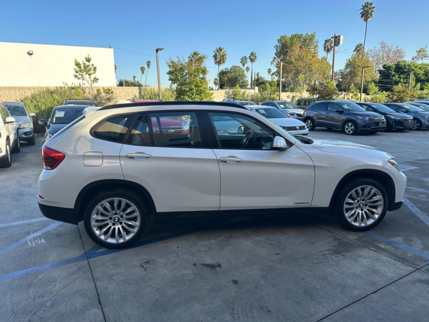 2014 WHITE /Black BMW X1 Leather (WBAVL1C56EV) with an 4 Cylinders engine, AUTOMATIC transmission, located at 30 S. Berkeley Avenue, Pasadena, CA, 91107, (626) 248-7567, 34.145447, -118.109398 - Don't let bad credit or financial setbacks hold you back from owning a luxury SUV like the 2014 BMW X1 xDrive28i. At our BHPH dealership, we're here to make the car-buying process as smooth and stress-free as possible. We invite you to visit our dealership in Pasadena, CA, to explore our inventory o - Photo#5